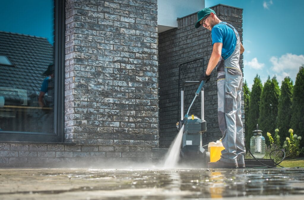 Men Washing Concrete