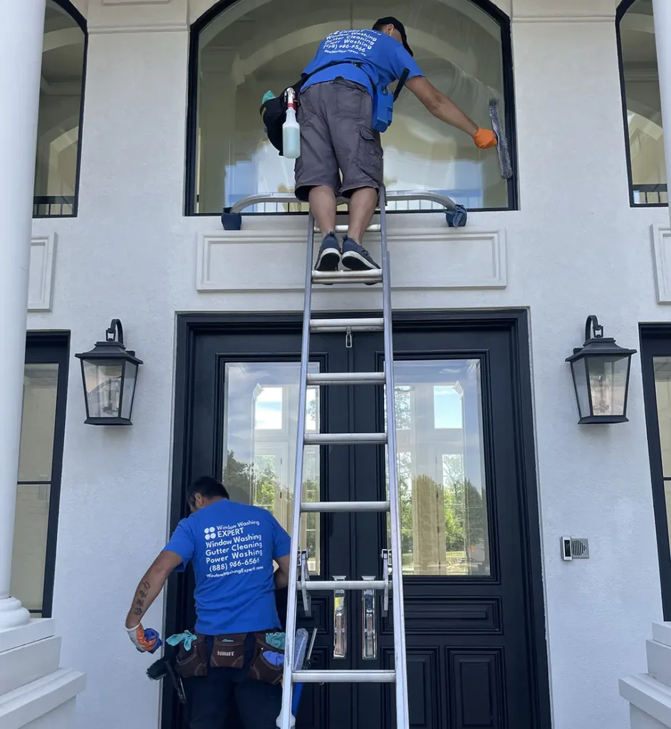 professional window washers at work