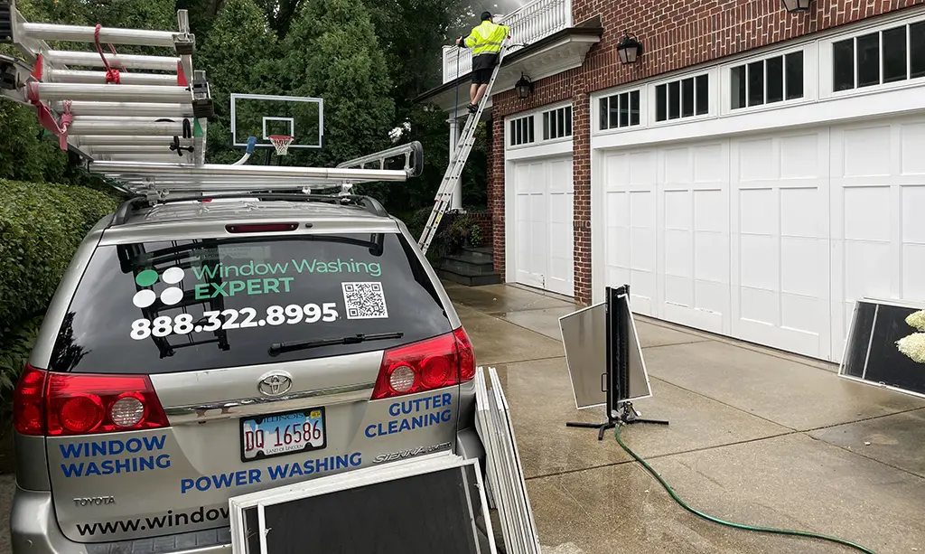 professional exterior cleaning service cleaning brick house