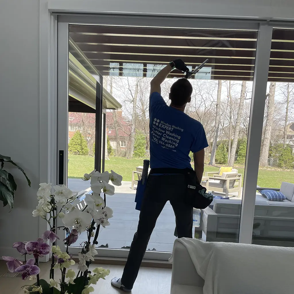 window washer cleans large windows